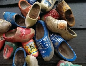 pile of clog shoes thumbnail