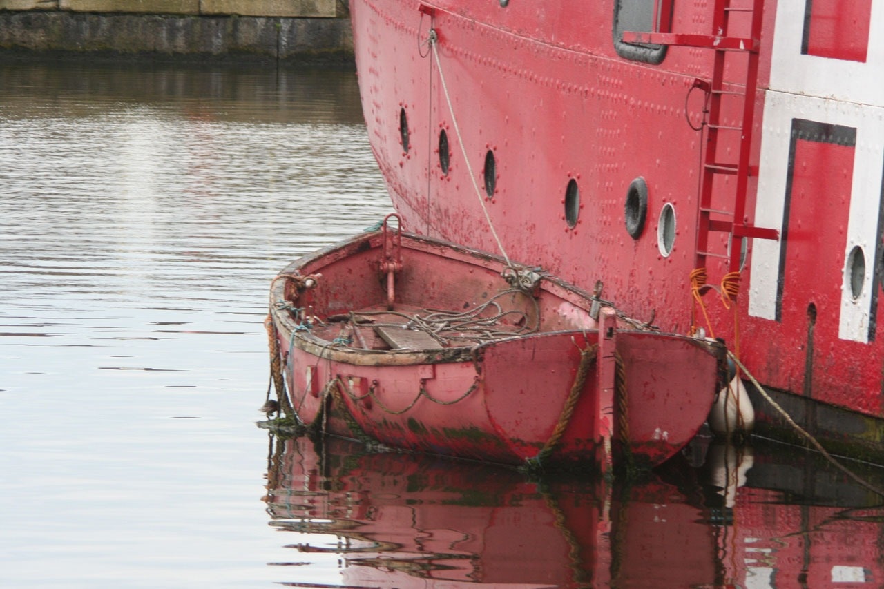 red steel row boat