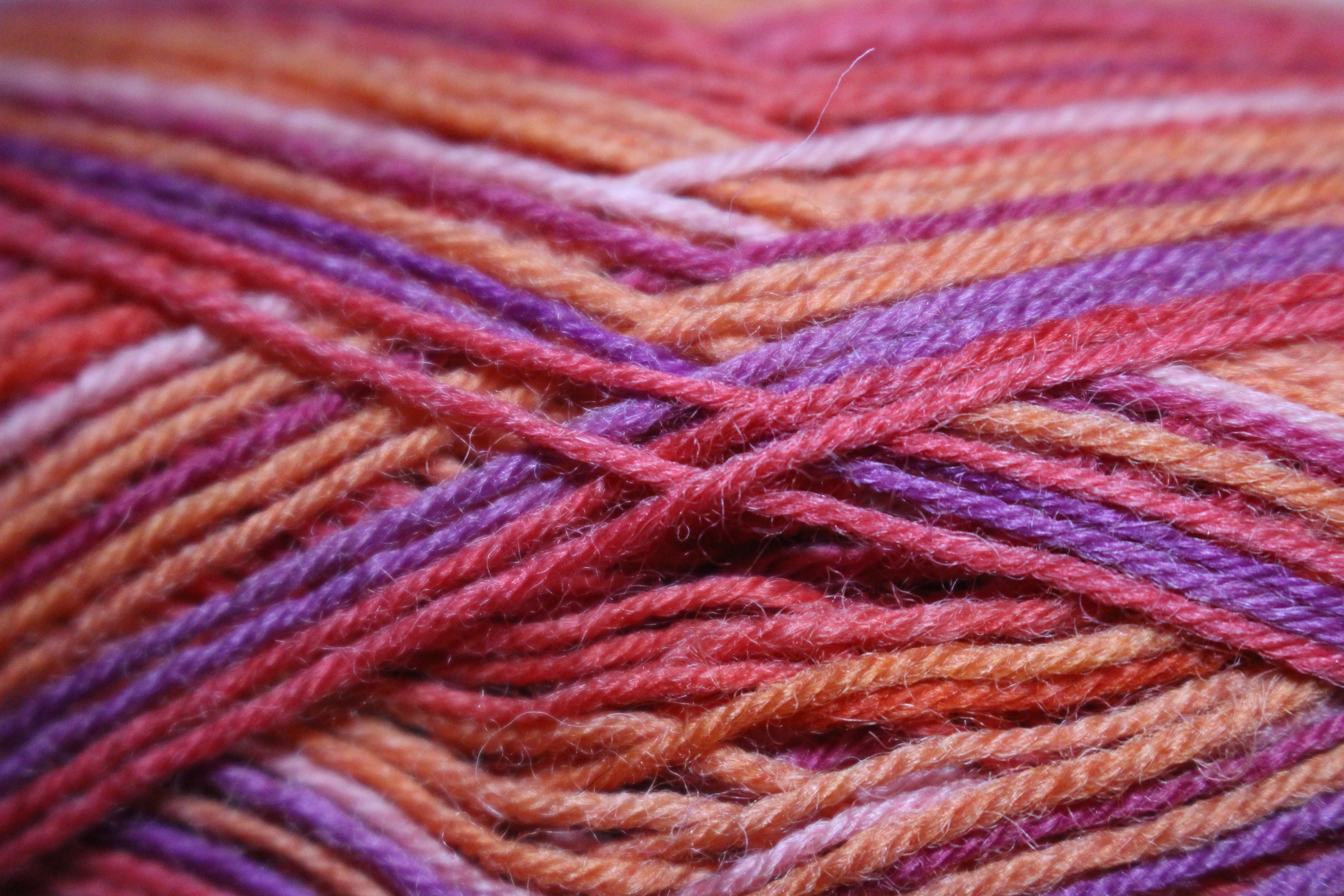 red purple and brown yarn