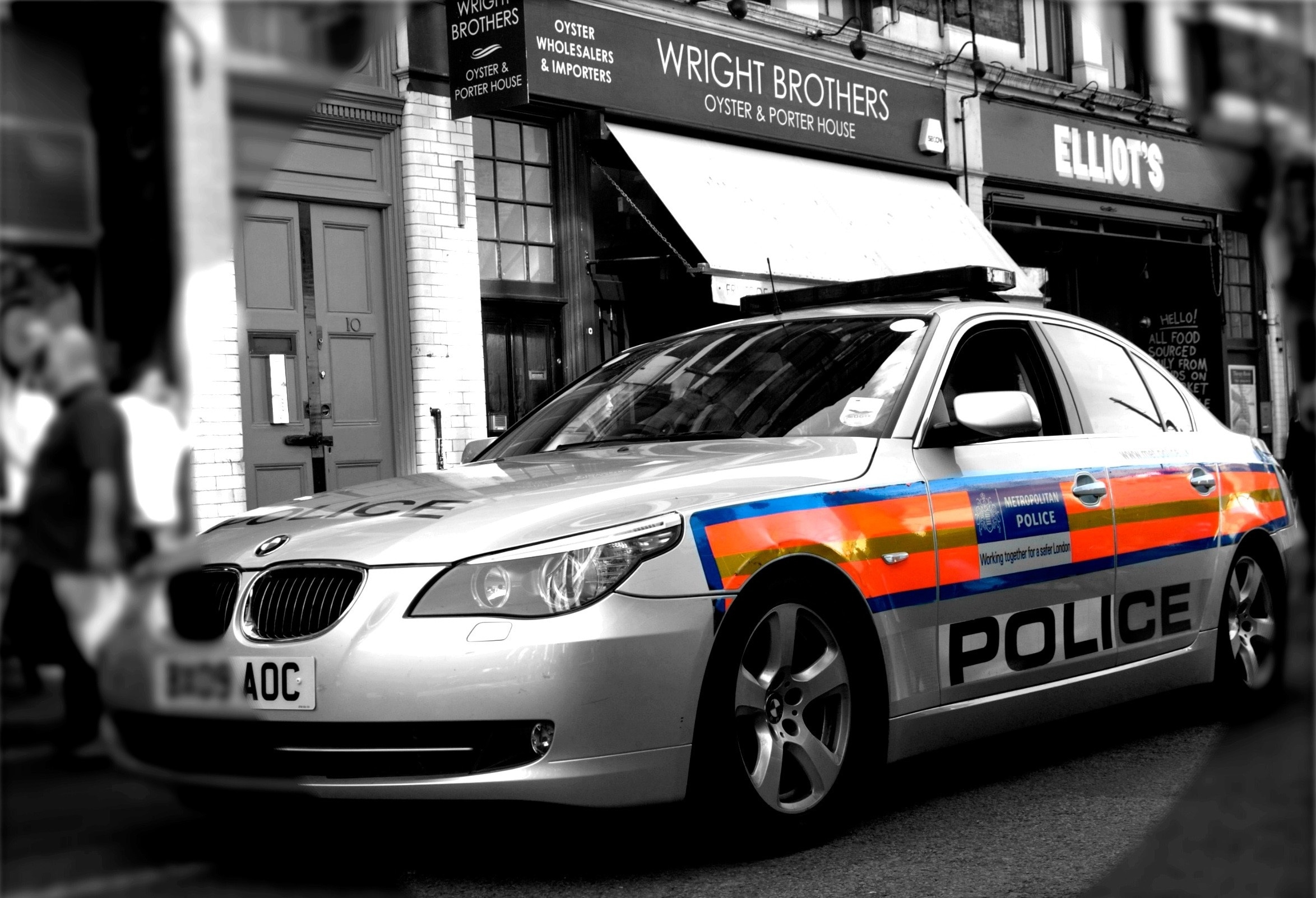 silver bmw 5 series police car