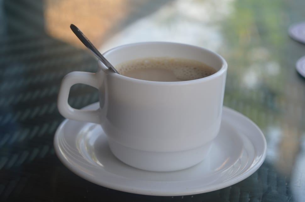white ceramic coffee mug and saucer preview