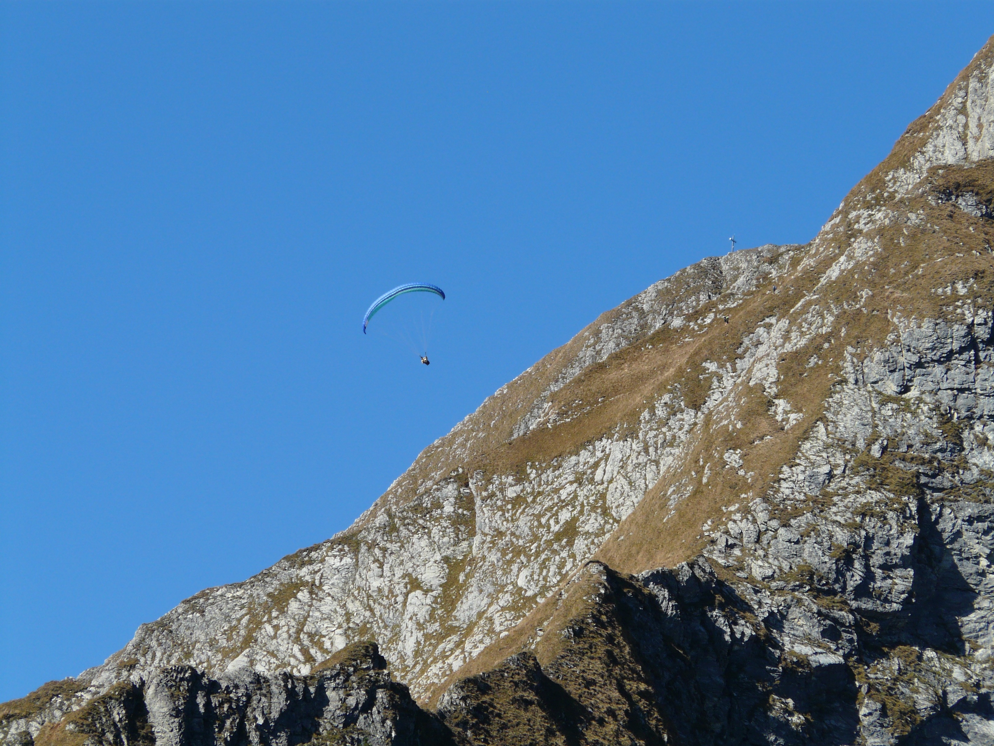 blue paraglider