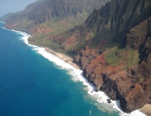 arial  view mountains and ocean photography thumbnail