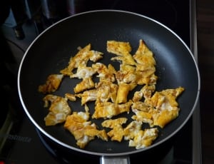 egg omelet in non-stick cooking pan thumbnail