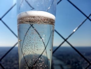 clear liquid in clear glass bottle thumbnail