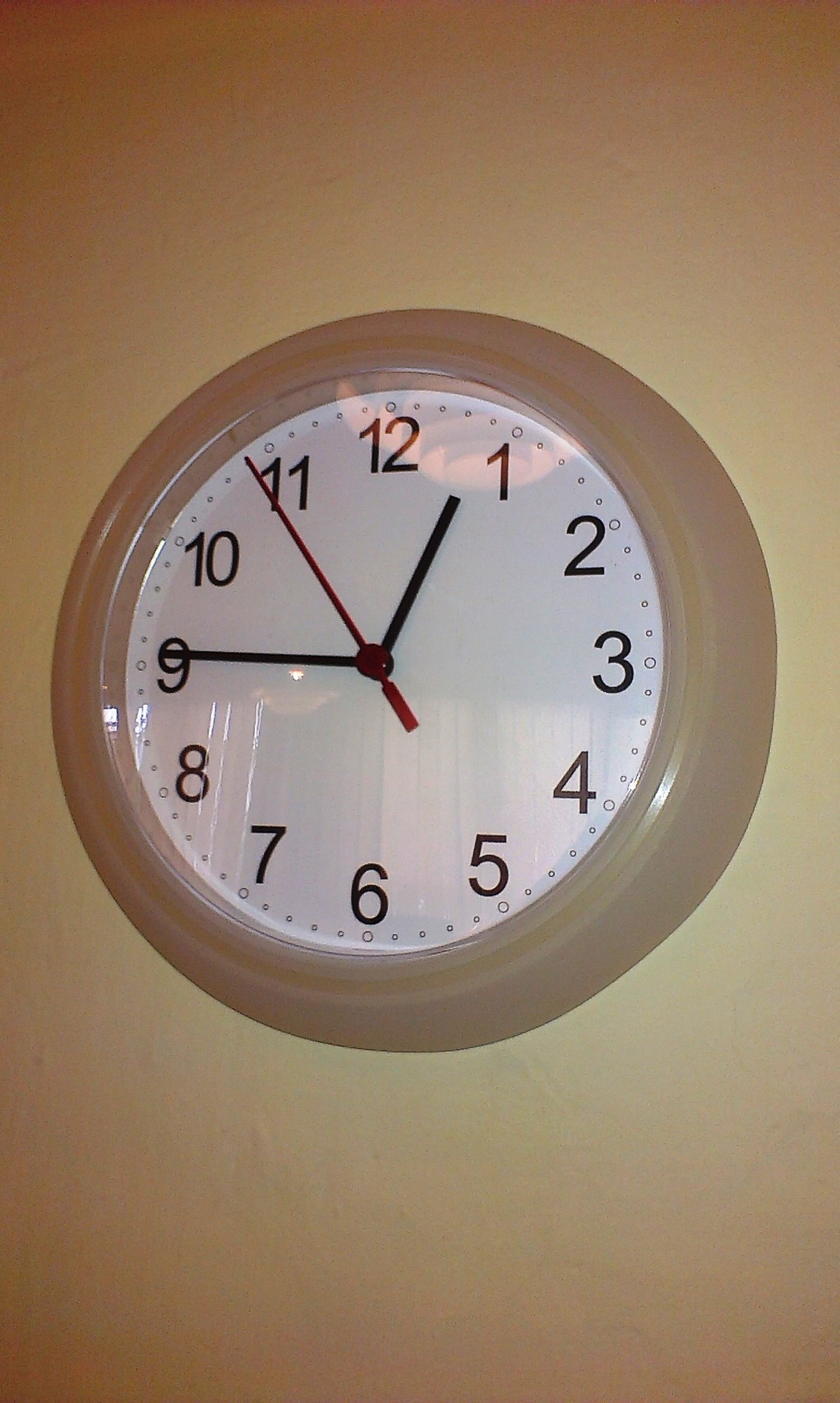gray analog wall mounted clock