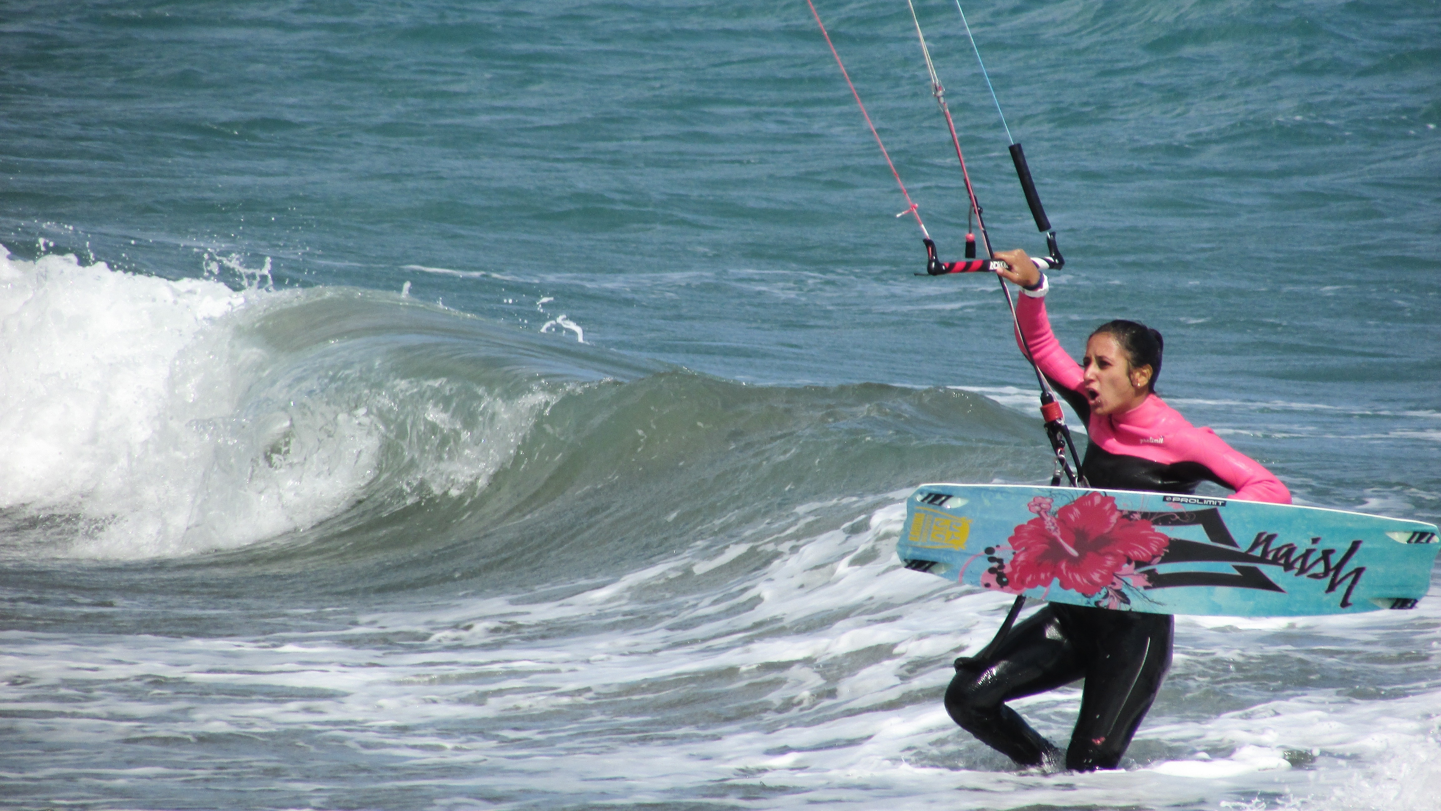 woman in pink and black wet suit