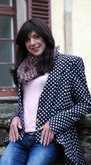 women's black and white polka dot blazer, blue denim jeans and brown scarf thumbnail