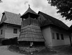 grayscale photography of wooden frame church thumbnail
