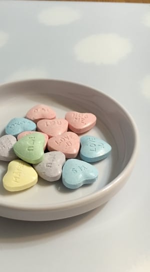 assorted colored heart shape medication pills thumbnail