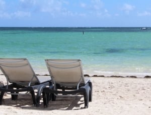 body of water and outdoor lounge chair thumbnail