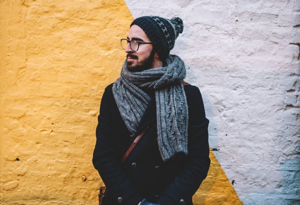 man wearing gray scarf and coat with knit cap preview