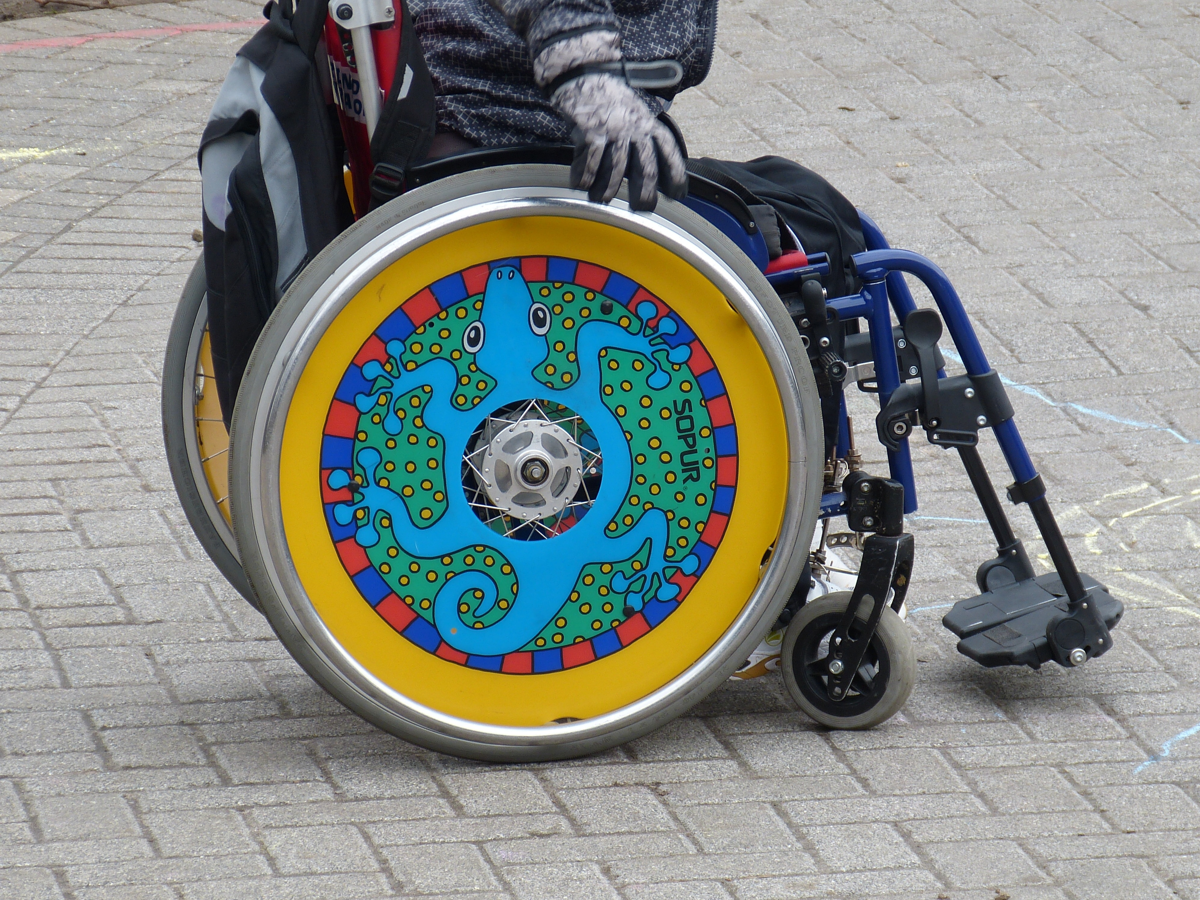 gray yellow and blue wheelchair