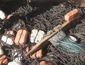fishing net with bricks thumbnail
