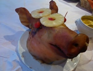 roasted pig head with pineapple slices thumbnail