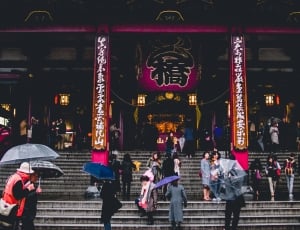people in front of oriental temple during daytime thumbnail