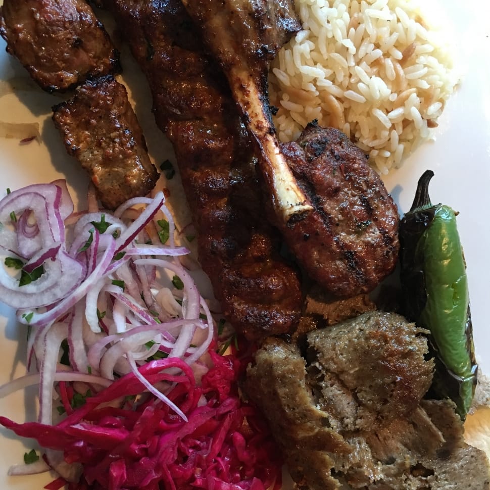 grilled meat with rice and slice red onions preview