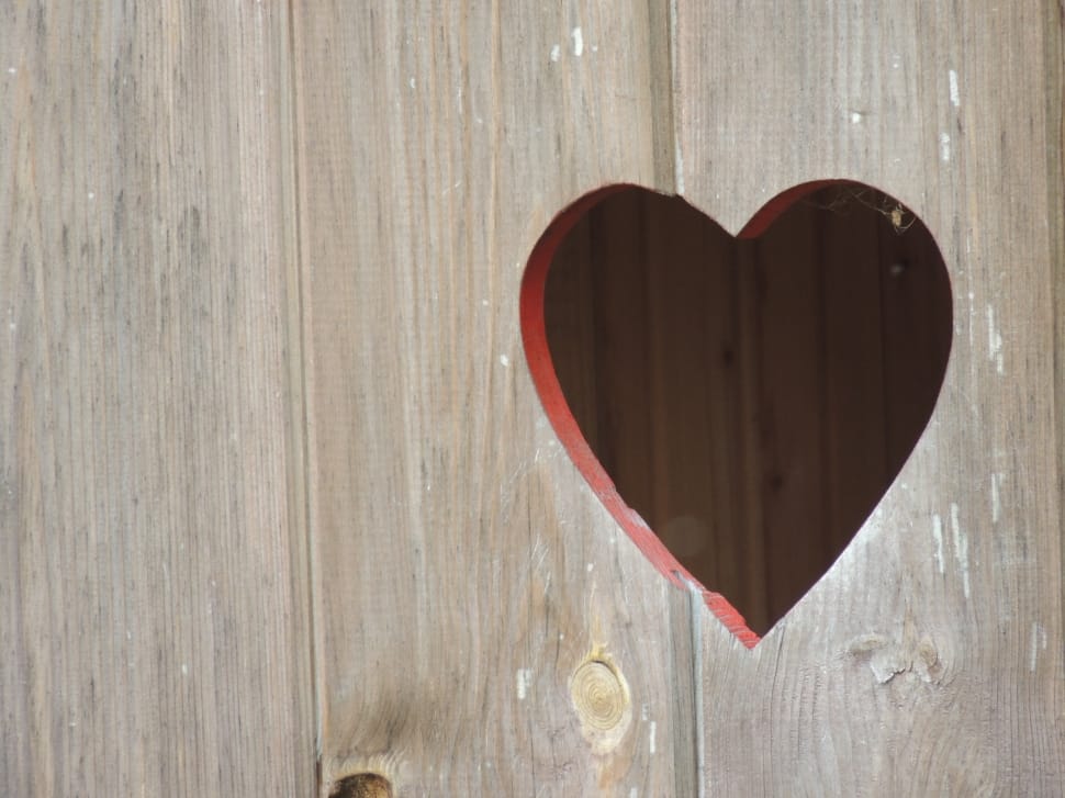 brown wooden wall with heart hole preview
