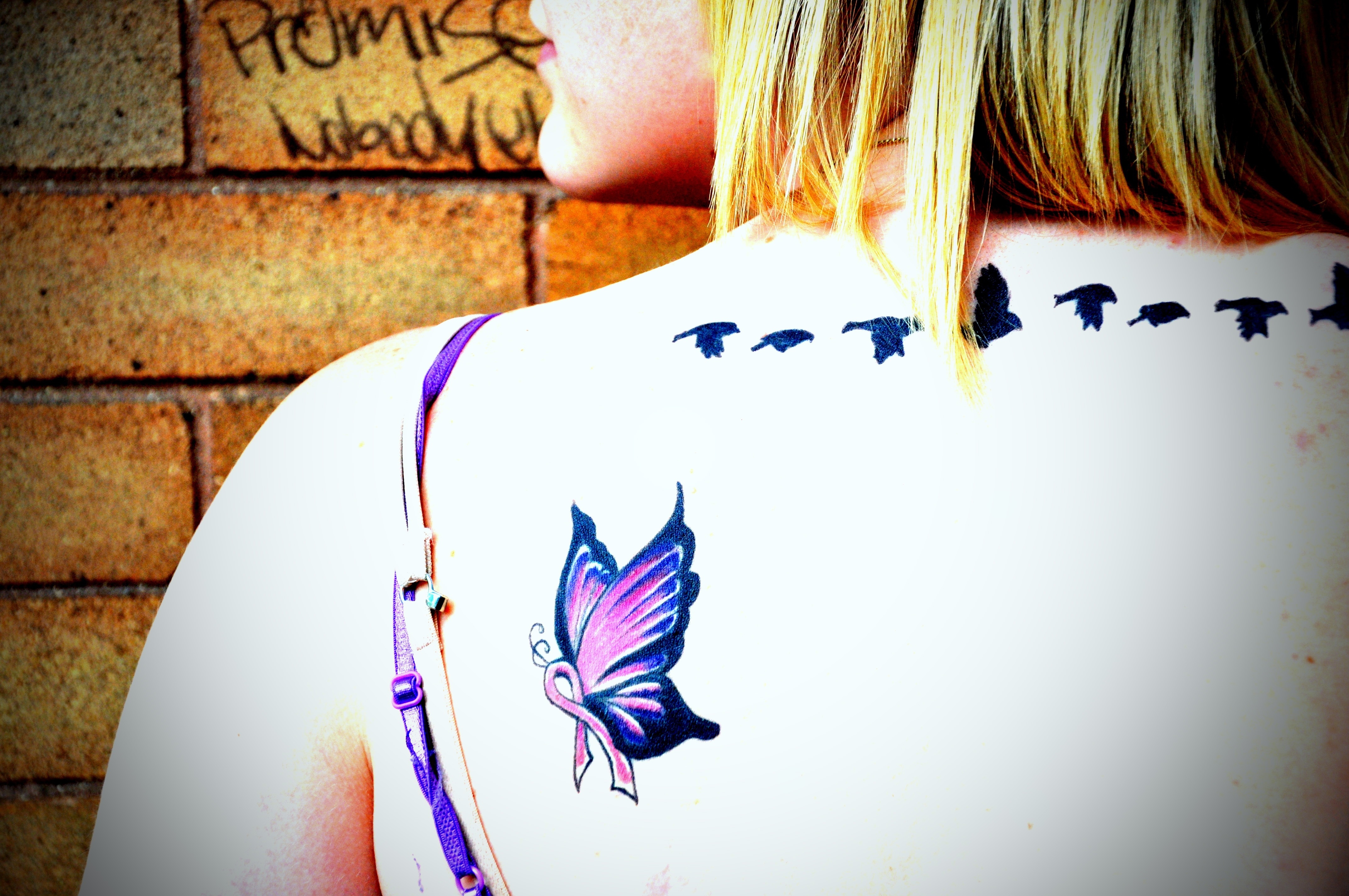 black and pink butterfly tattoo