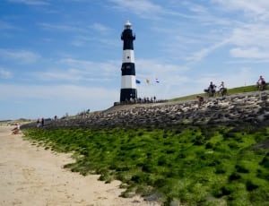 white and black stripe lighthouse thumbnail