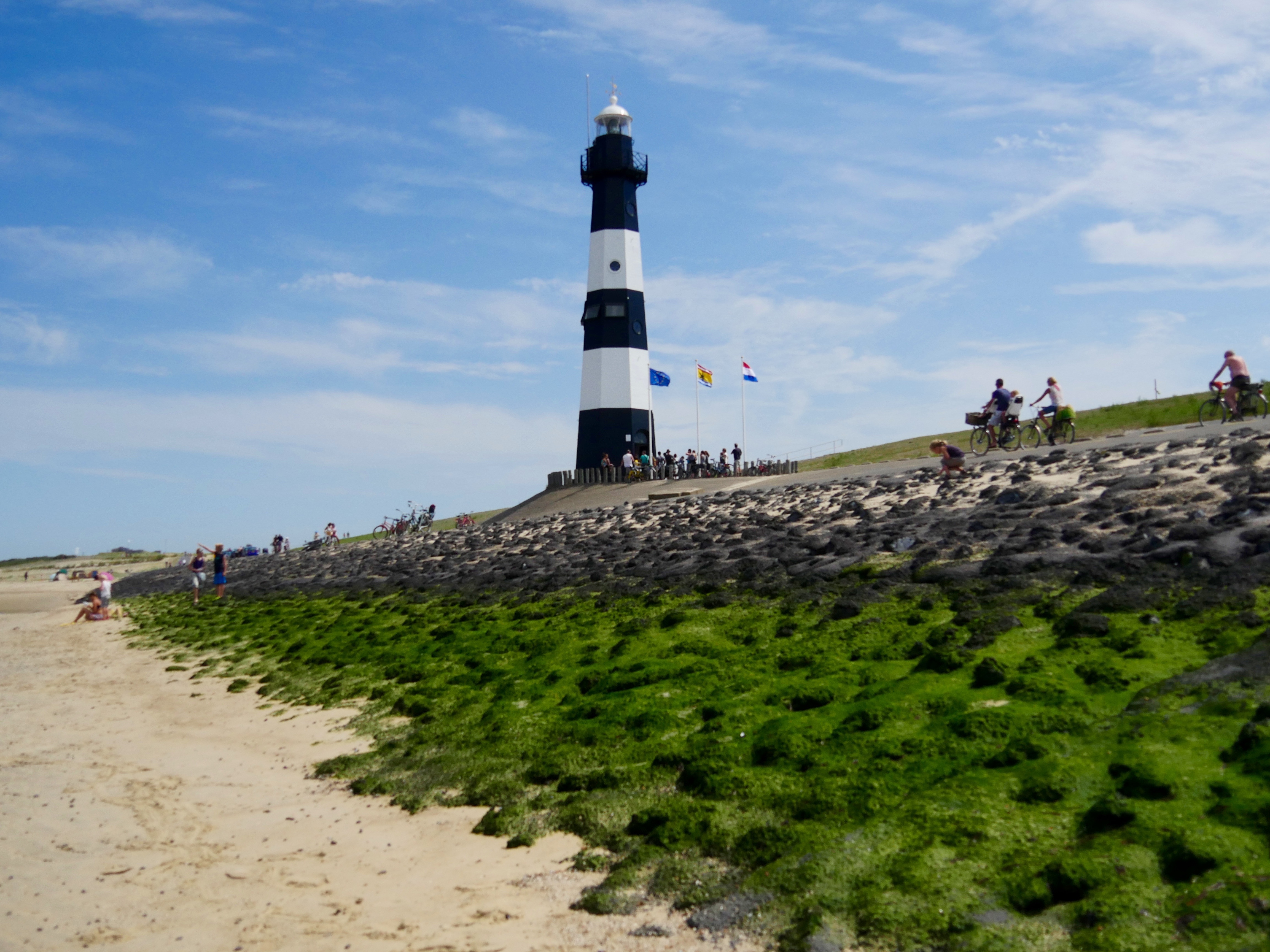 white and black stripe lighthouse