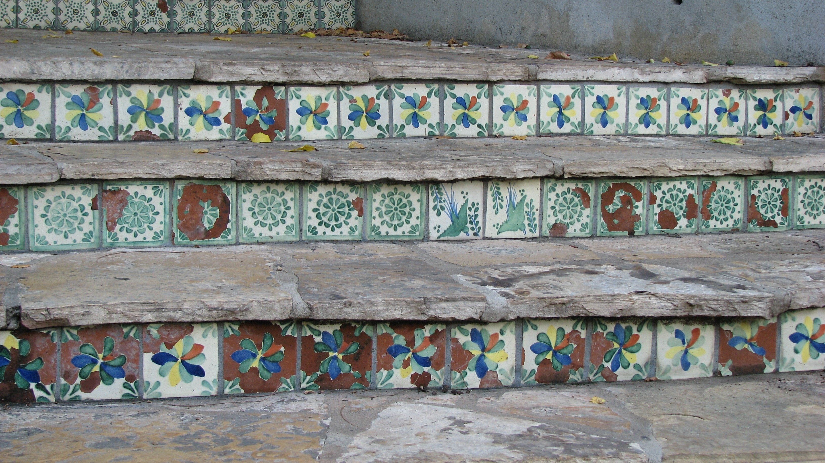 gray green and brown floral concrete stairs