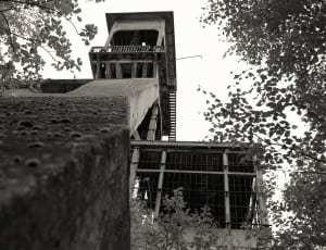 grayscale photo of a 3 story house thumbnail