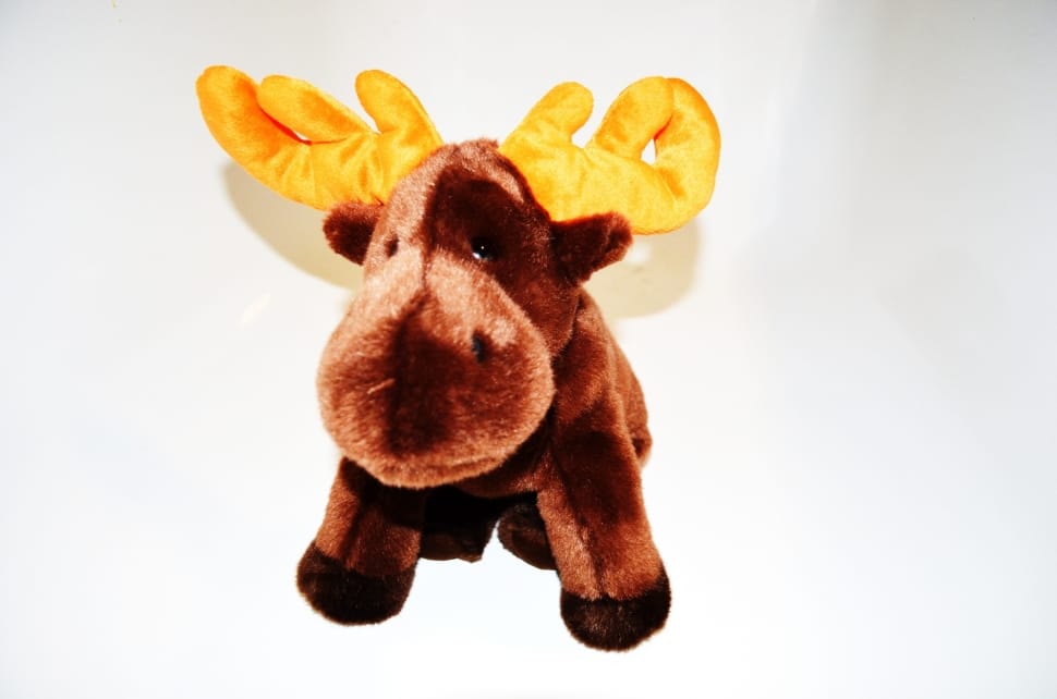 brown and yellow animal plush toy preview