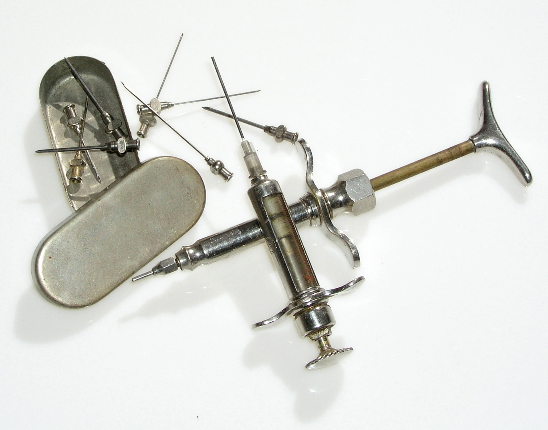 brass syringe set and case