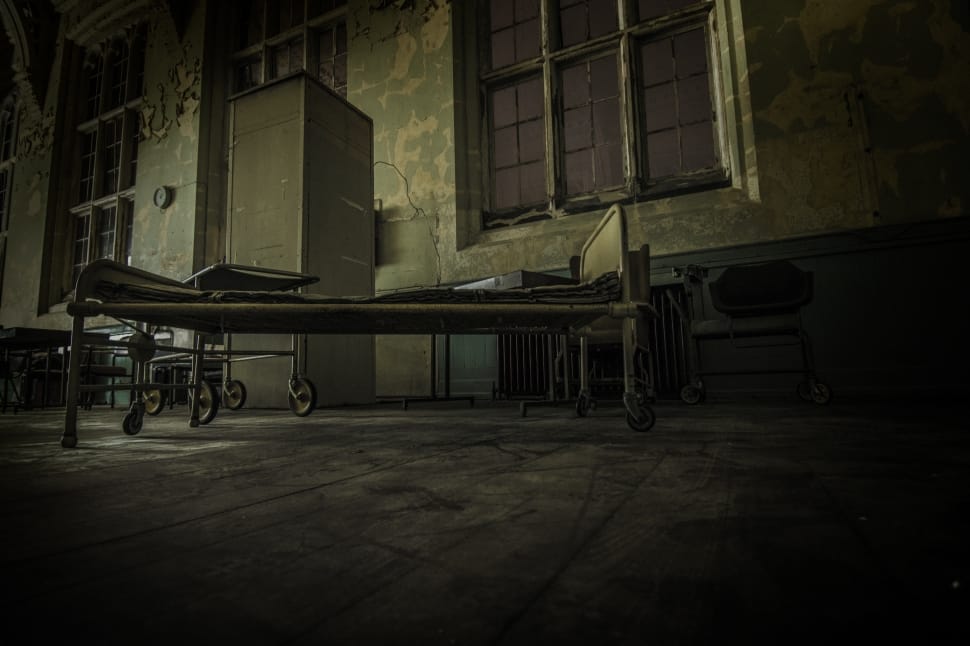 low angle view of grey metal hospital bed preview