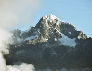 snow covered in mountain during daytime thumbnail