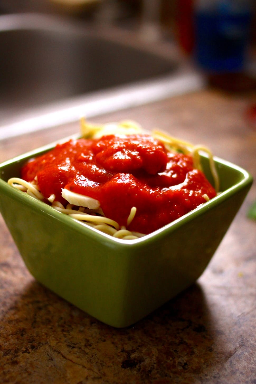 pasta top with tomato sauce and cheese preview