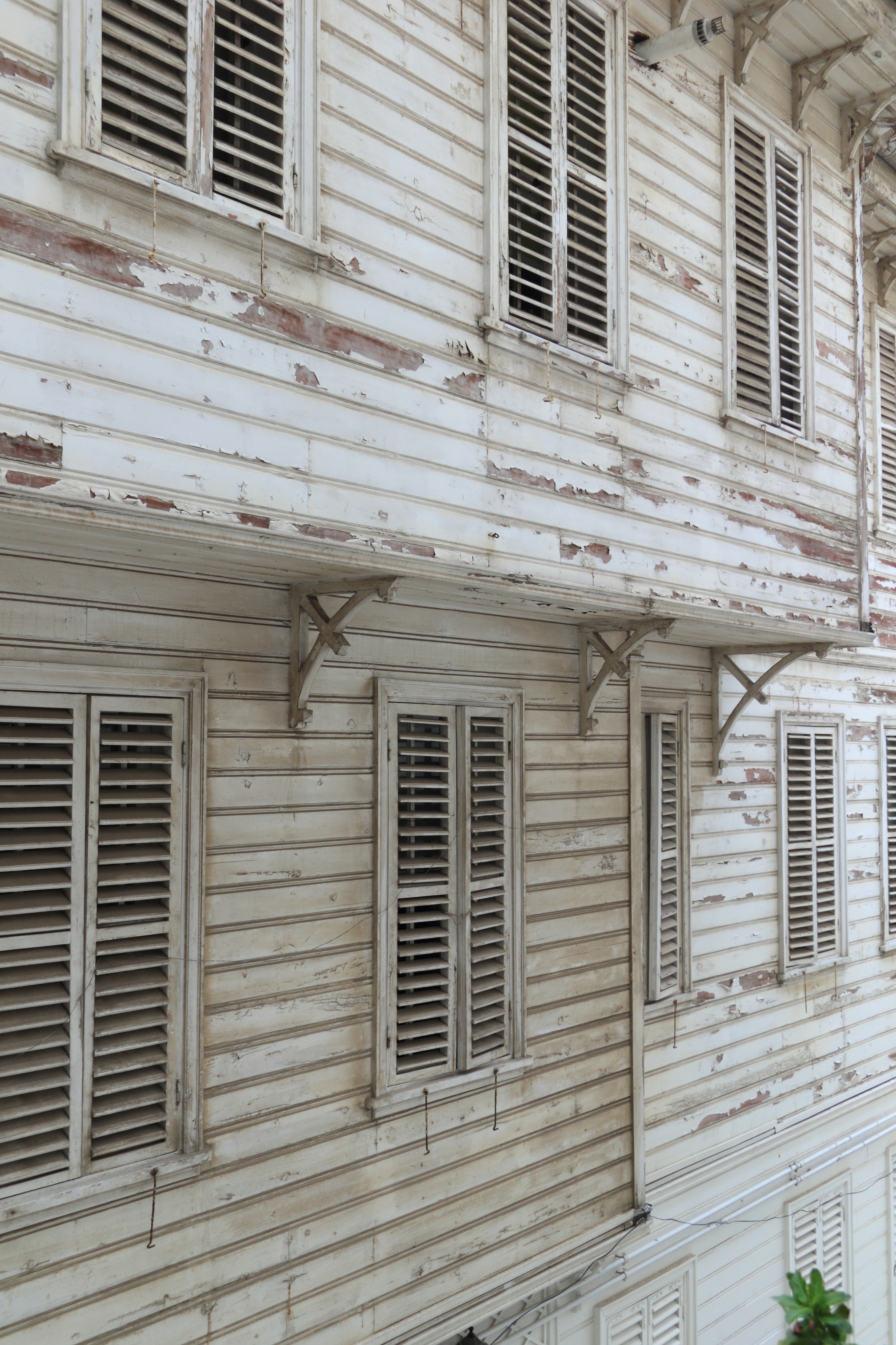 white wooden louvre window