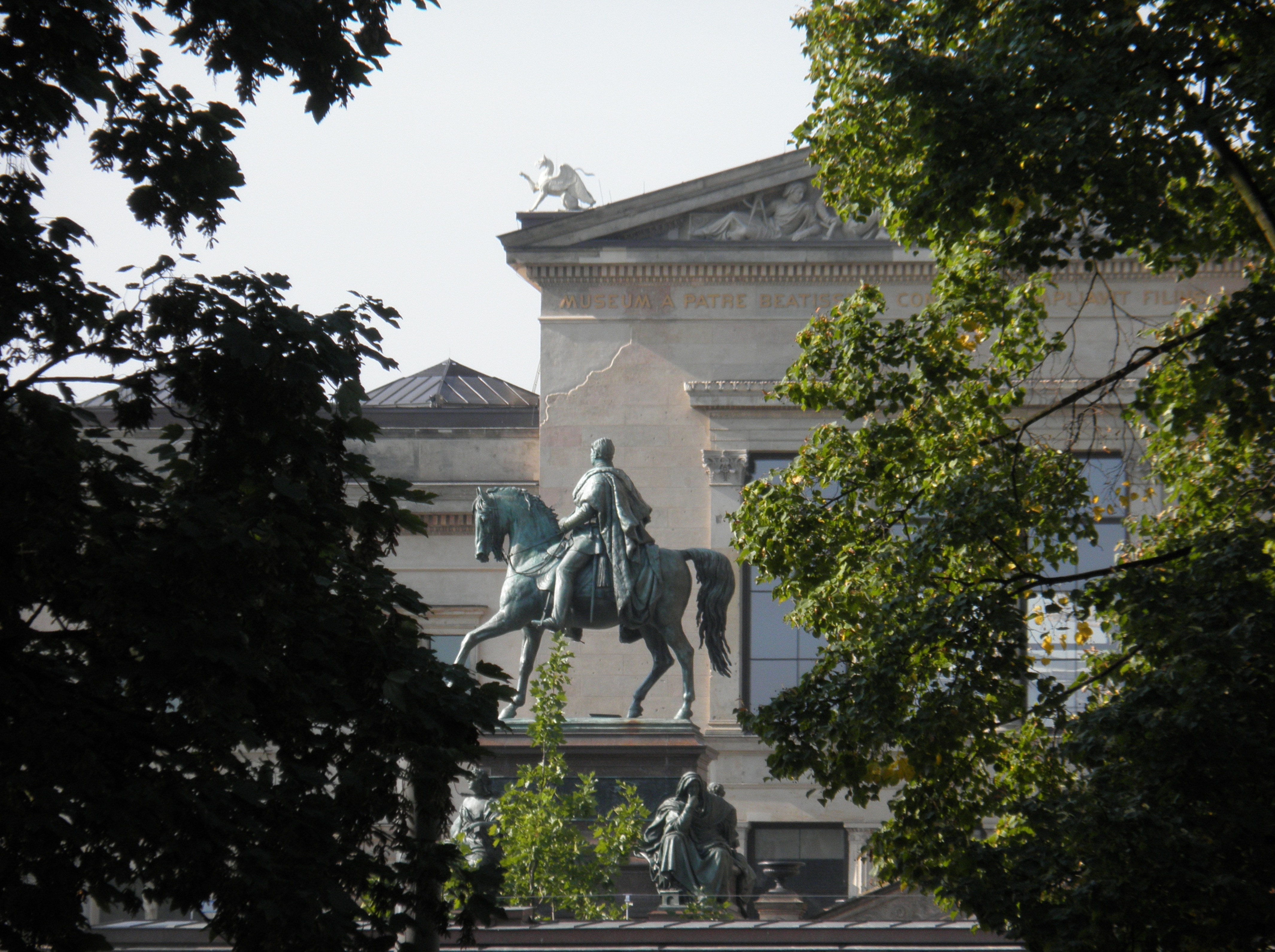 man on horse concrete statue