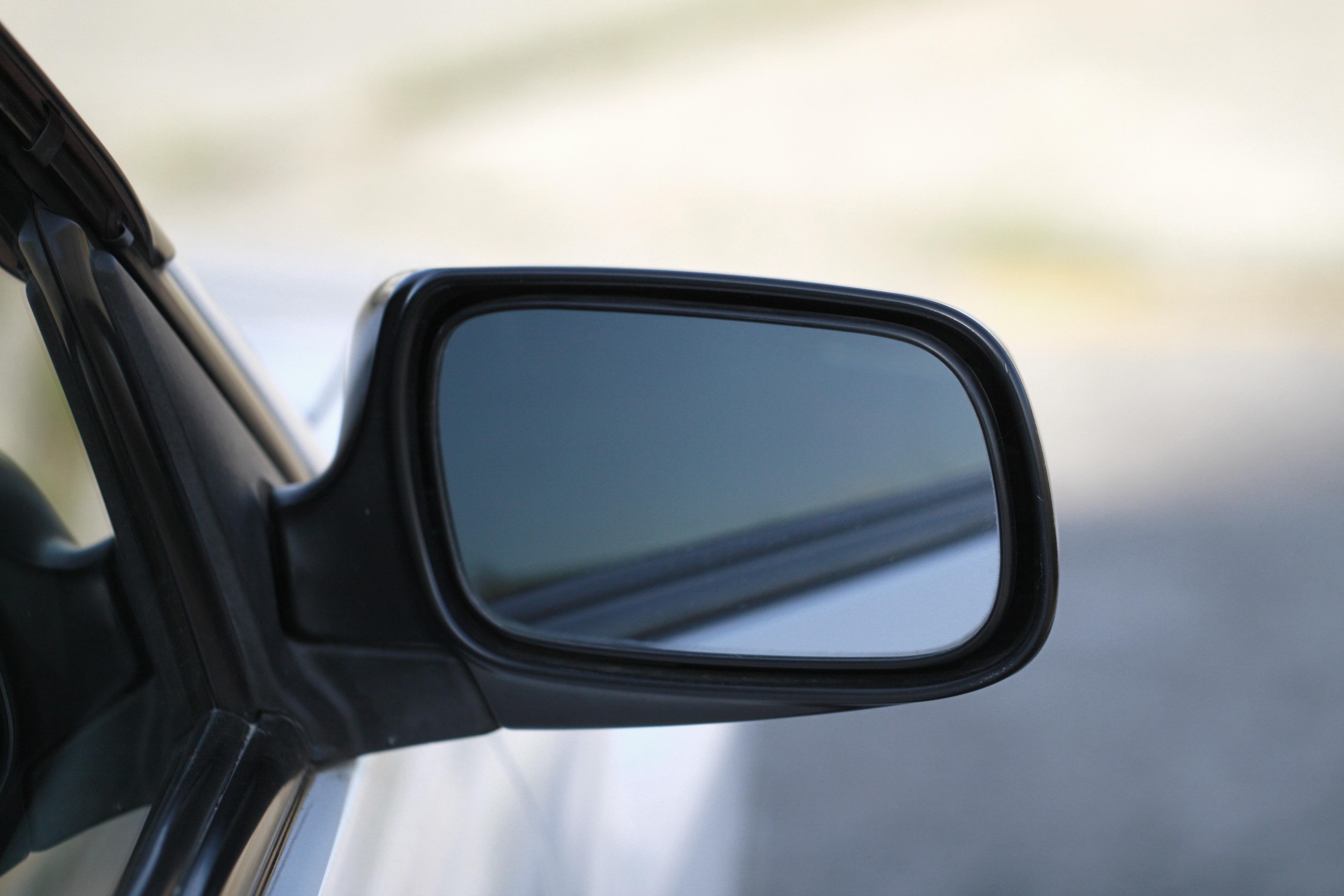 black frame right car side mirror