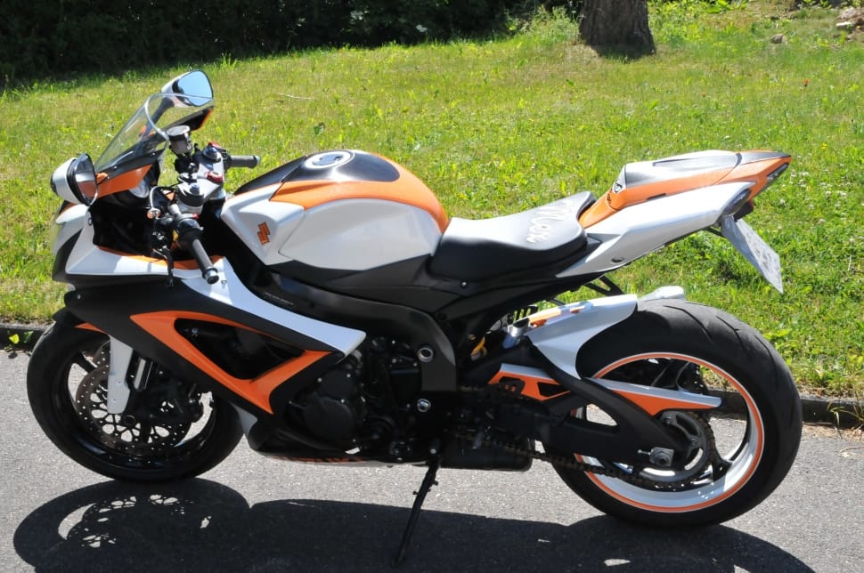 white black and orange sports bike preview