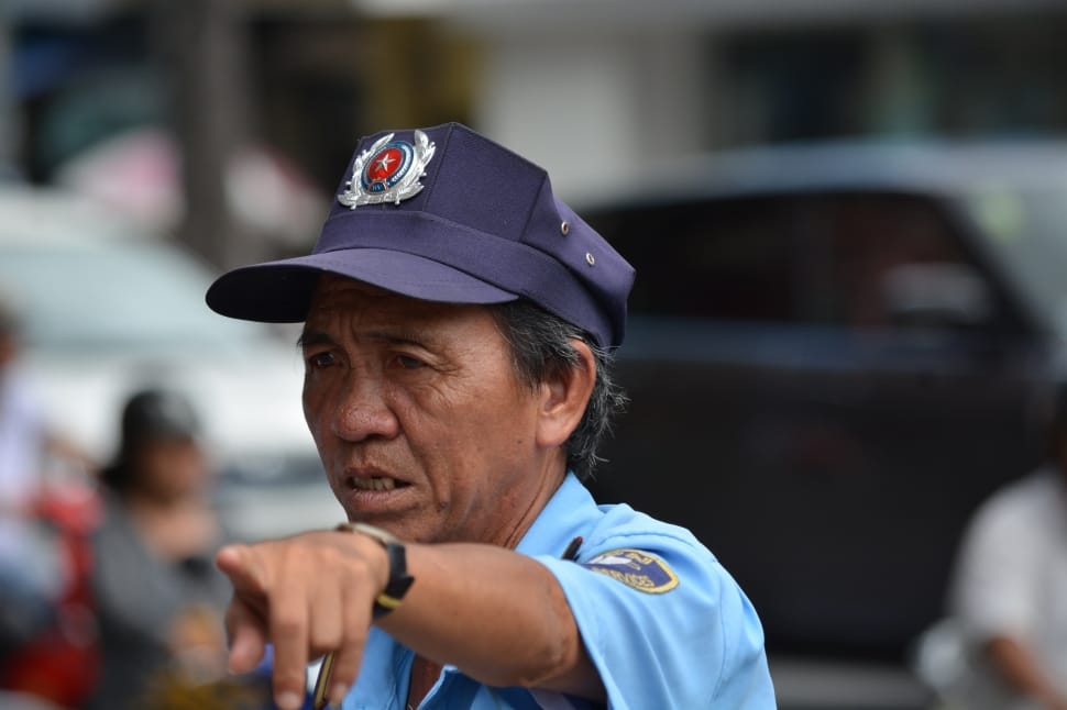 close up photo of person wearing police uniform preview