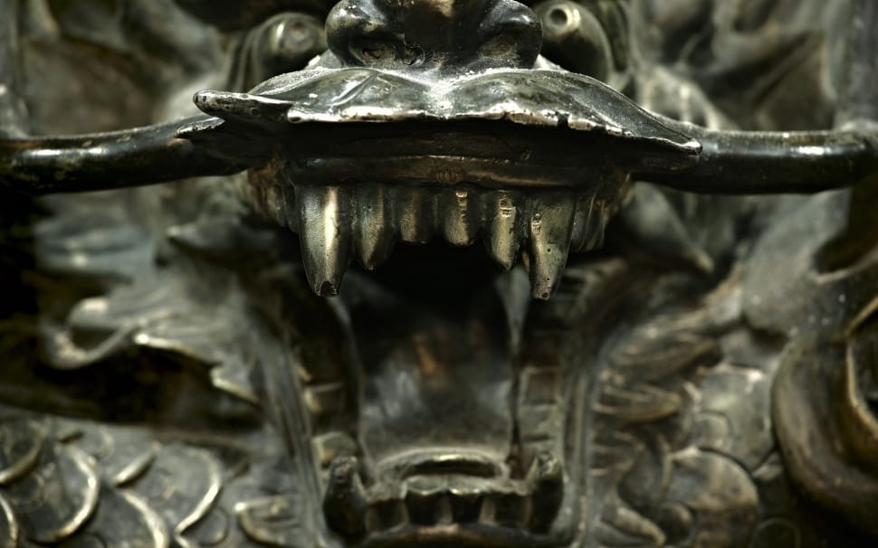 close up photo black fanged creature preview
