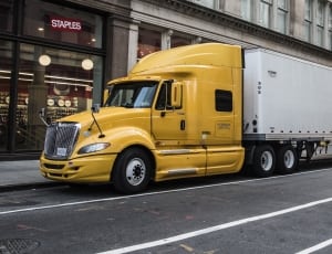 yellow and white freight truck thumbnail