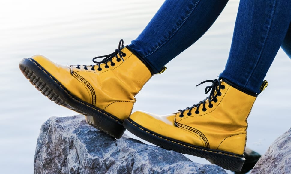 pair of yellow and black work boots preview