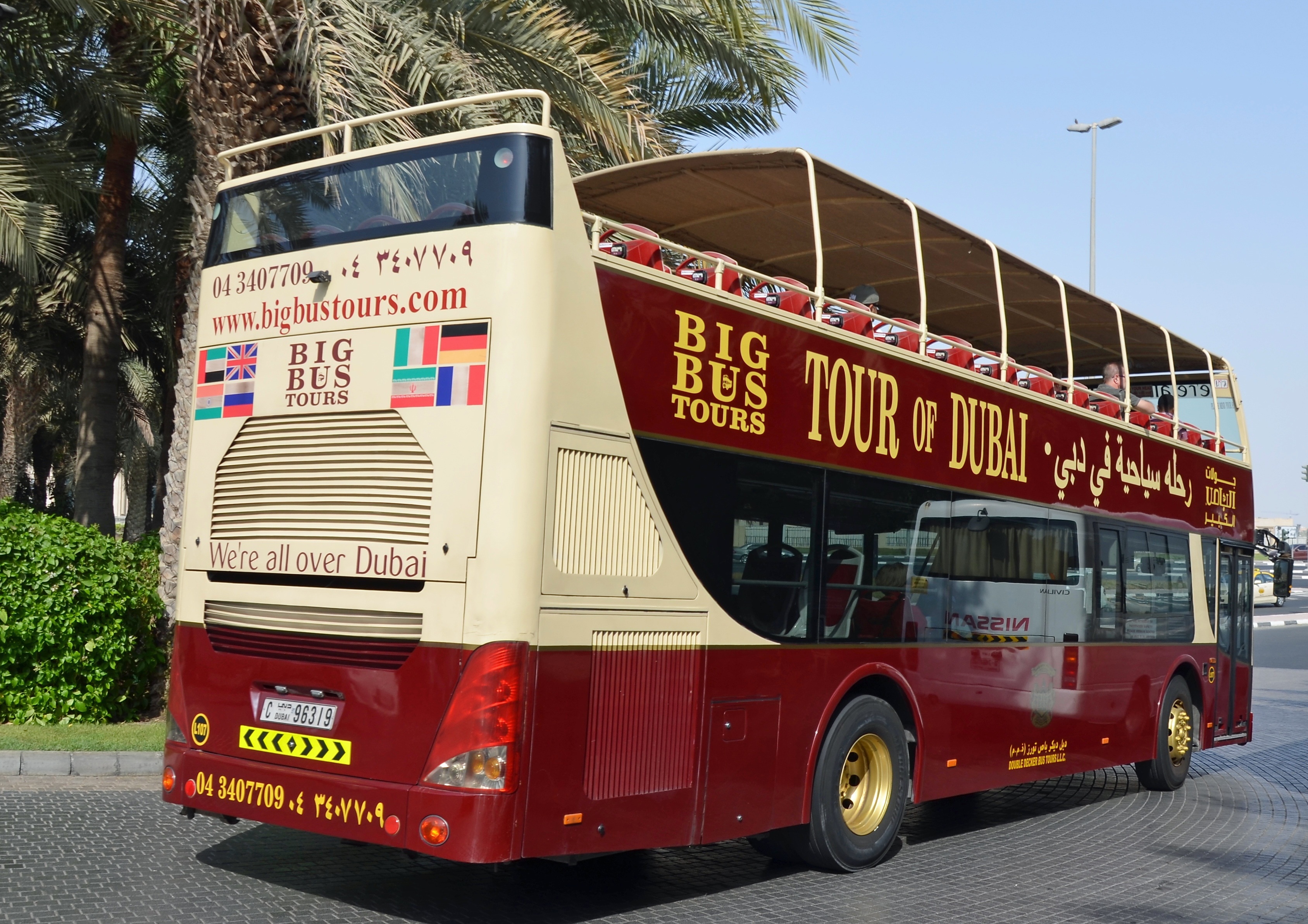 red and white double deck bus