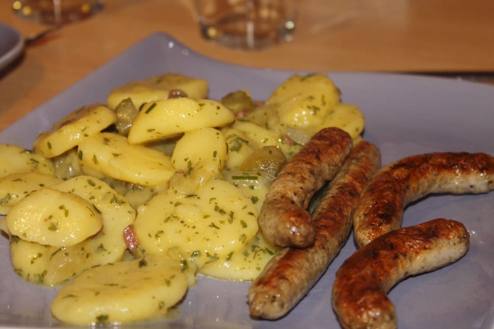 sausages with sliced potato dish preview