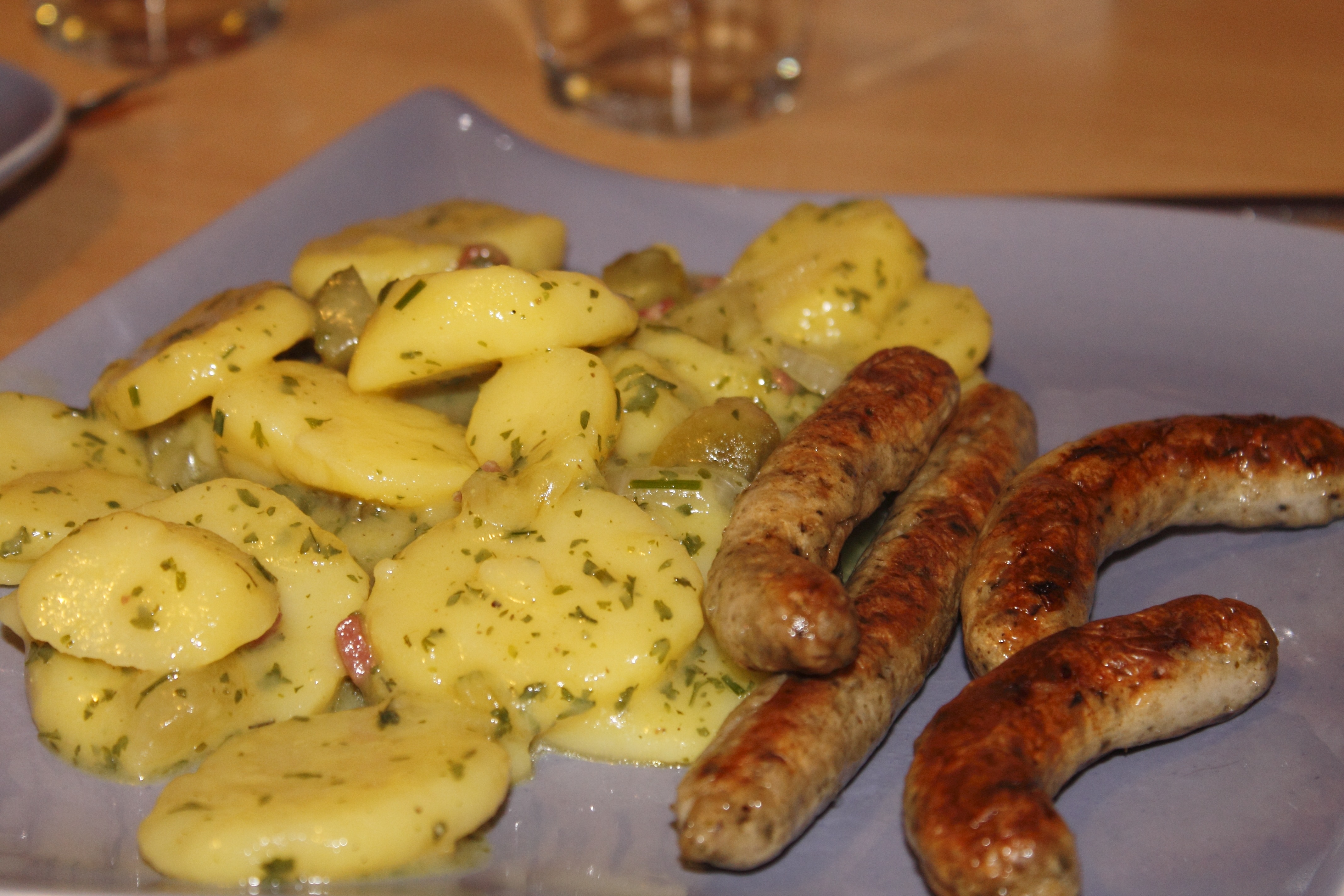 sausages with sliced potato dish