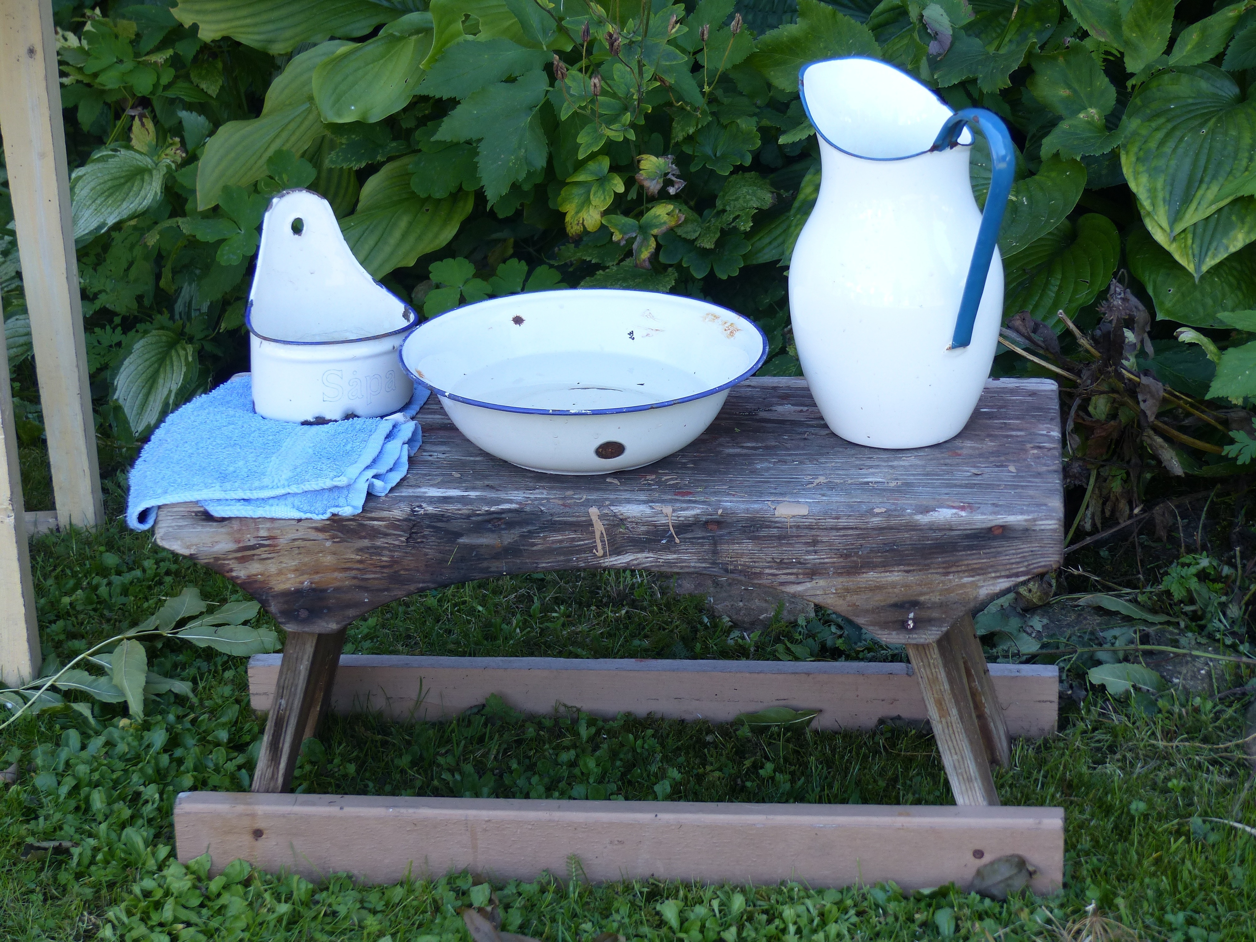 3 white and blue ceramic pitcher and bowls