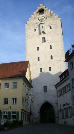 white concrete tower with clock thumbnail