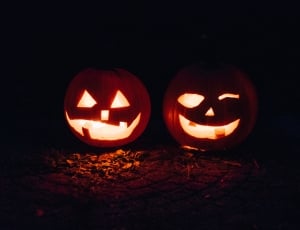 two carved pumpkin lanterns thumbnail