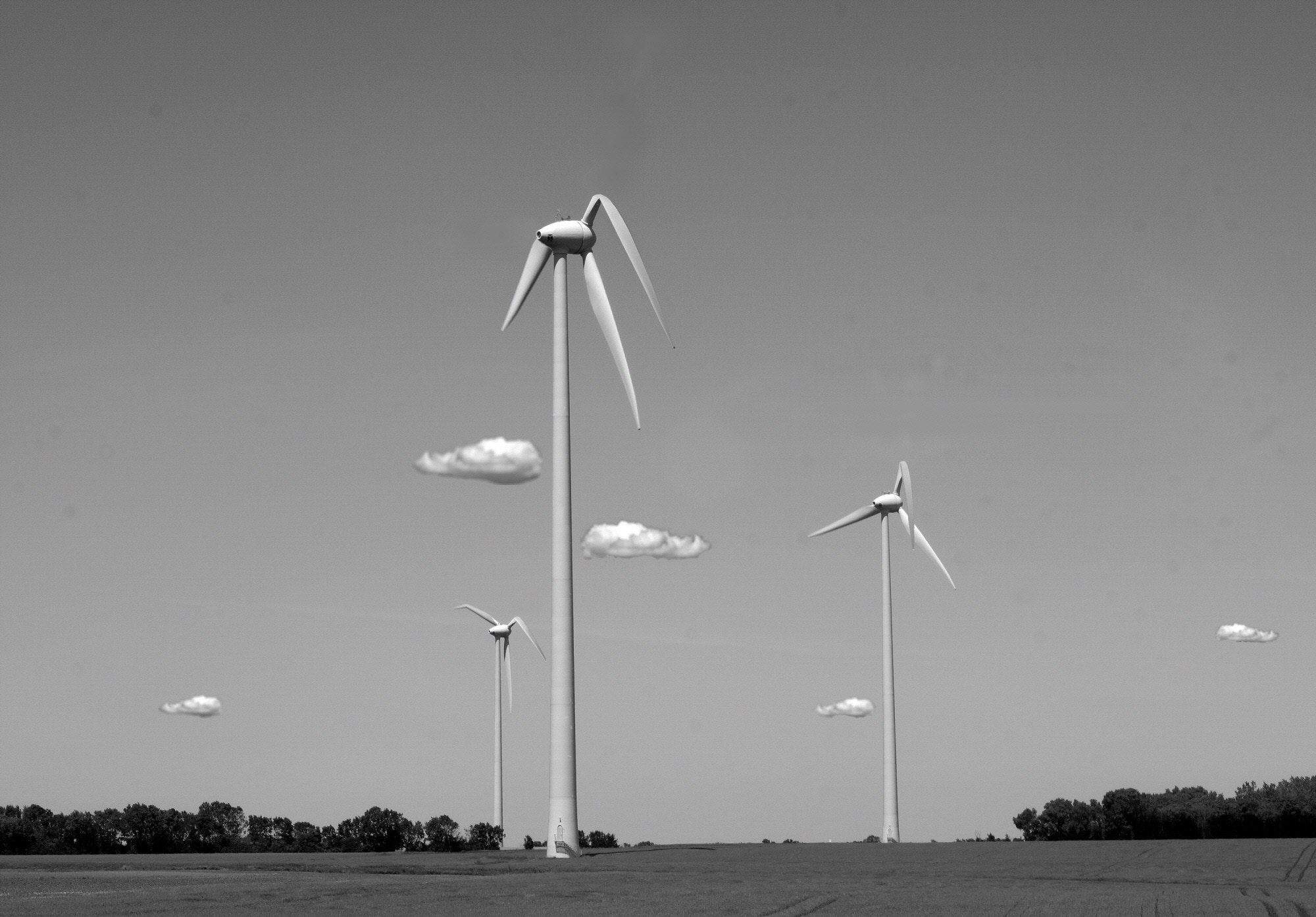 windmills under cloudy sky photo