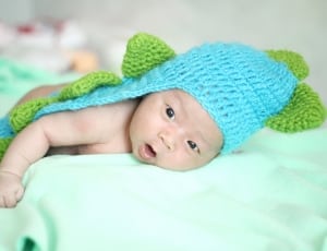 baby's blue and green dinosaur suit thumbnail