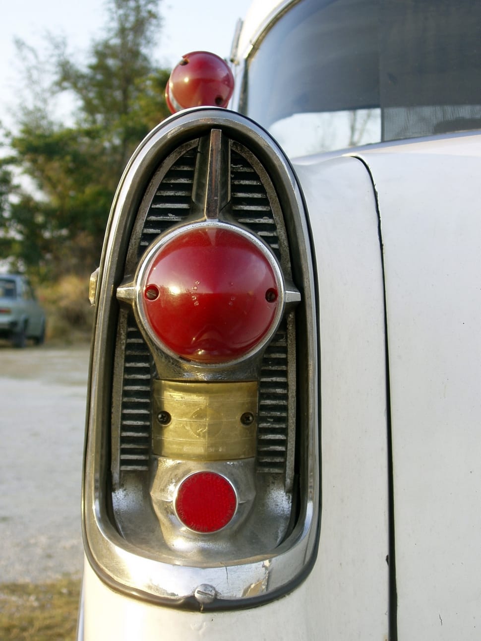 silver and red car taillight preview