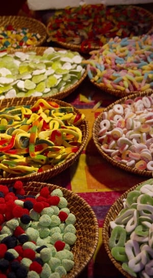 assorted candies in bowls thumbnail